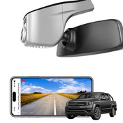 Car rearview mirror built-in dash cam with smartphone app control, 4K Ultra HD recording, GPS tracking, and Volkswagen Amarok Pickup models in the background.