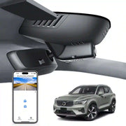 Car rearview mirror built-in dash cam with smartphone app control, 4K Ultra HD recording, GPS tracking, and Volvo XC40 SUV models in the background.