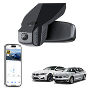 Car rearview mirror built-in dash cam with smartphone app control, 4K Ultra HD recording, GPS tracking, and BMW 3 Series Gen6 models in the background.