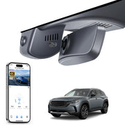 Car rearview mirror built-in dash cam with smartphone app control, 4K Ultra HD recording, GPS tracking, and Mazda CX-50 Off-road SUV models in the background.